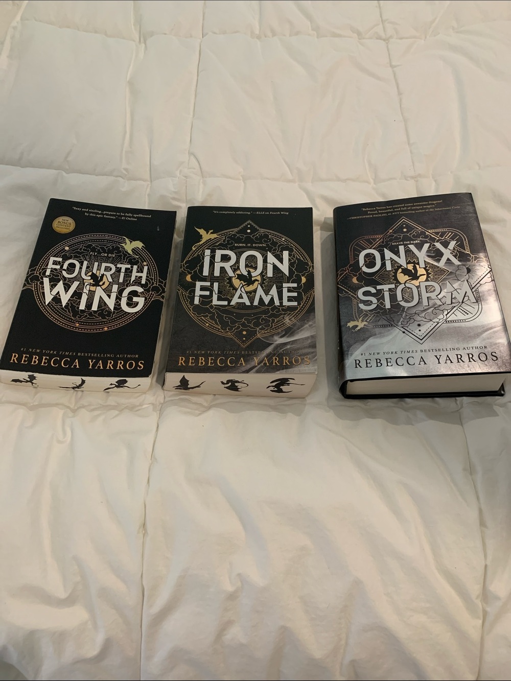 Onyx Storm Hardcover - Black Cover Home Accent Book plus 2 other paperbacks.